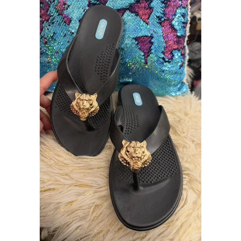 New Okab Black Licorice Gold Lion Head Rubber Flip Flop Thong Sandals Womens M/L